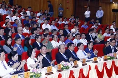 Thủ tướng Nguyễn Xuân Phúc và các đại biểu tham dự hội nghị xúc tiến đầu tư, Thương mại và Du lịch tỉnh Lào Cai 2019. (Ảnh: Thống Nhất/TTXVN)