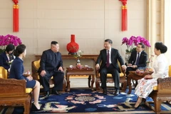 Chủ tịch Trung Quốc Tập Cận Bình (giữa, phải) trong cuộc gặp nhà lãnh đạo Triều Tiên Kim Jong-un (giữa, trái) tại Bắc Kinh ngày 8/1/2019. (Ảnh: THX/TTXVN)