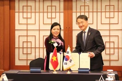 Quang cảnh lễ ký kết. (Ảnh: Phóng viên TTXVN tại Hàn Quốc)