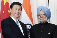 Chủ tịch Trung Quốc Tập Cận Bình và Thủ tướng Ấn Độ Manmohan Singh. (Ảnh: AFP)
