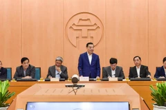 Chủ tịch UBND TP Hà Nội Chu Ngọc Anh chỉ đạo các ban, ngành và địa phương ứng phó với diễn biến mới của dịch COVID-19. (Ảnh: Trung Nguyên/TTXVN)