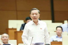 Đại tướng Tô Lâm, Bộ trưởng Bộ Công an trả lời chất vấn của đại biểu Quốc hội. (Ảnh: Phương Hoa/TTXVN)