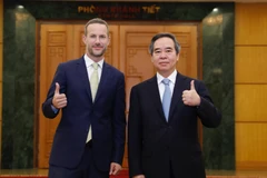 Trưởng Ban Kinh tế Trung ương Nguyễn Văn Bình tiếp Tổng Giám đốc Cơ quan Phát triển tài chính quốc tế Hoa Kỳ Adam Boehler. (Ảnh: Dương Giang/TTXVN)