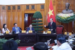 Phó Thủ tướng Thường trực Trương Hòa Bình phát biểu, động viên các doanh nghiệp, doanh nhân trẻ tiếp tục vượt qua khó khăn do đại dịch COVID-19. (Ảnh: Lâm Khánh/TTXVN)