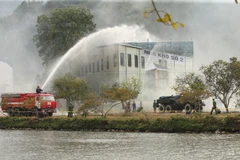 [Photo] Bộ đội hóa học diễn tập ứng phó sự cố môi trường