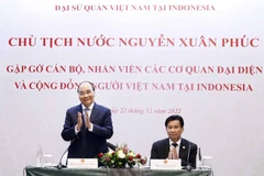 Chủ tịch nước Nguyễn Xuân Phúc tại buổi gặp gỡ cán bộ, nhân viên các cơ quan đại diện và đại diện cộng đồng người Việt Nam tại Indonesia. (Ảnh: Thống Nhất/TTXVN)
