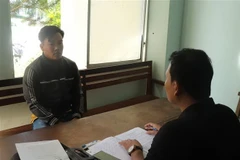 Đối tượng Phạm Văn Tiện tại Cơ quan công an. (Ảnh: TTXVN phát)