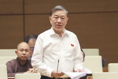Bộ trưởng Bộ Công an Tô Lâm phát biểu giải trình, làm rõ một số vấn đề đại biểu Quốc hội nêu. (Ảnh: Doãn Tấn/TTXVN)