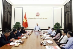 Chủ tịch nước Nguyễn Xuân Phúc, Chủ tịch danh dự Hội Chữ thập Đỏ Việt Nam khóa XI chủ trì buổi làm việc với lãnh đạo Trung ương Hội Chữ thập Đỏ Việt Nam. (Ảnh: Thống Nhất/TTXVN)