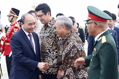 Lễ tiễn Chủ tịch nước Nguyễn Xuân Phúc tại Sân bay Quốc tế Soekarno Hatta, Jakarta. (Ảnh: Thống Nhất/TTXVN)