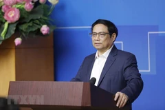 Thủ tướng Phạm Minh Chính phát biểu tại hội nghị. (Ảnh: Dương Giang/TTXVN)