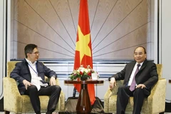 Chủ tịch nước Nguyễn Xuân Phúc tiếp Chủ tịch Phòng Thương mại và Công nghiệp Indonesia Arsjad Rasjid. (Ảnh: Thống Nhất/TTXVN)