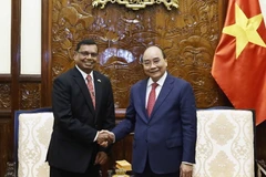 Chủ tịch nước Nguyễn Xuân Phúc tiếp Đại sứ Sri Lanka Srilanka Prasanna Gamage. (Ảnh: Thống Nhất/TTXVN)