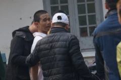 Lực lượng chức năng đã khống chế thành công đối tượng. (Ảnh: PV/Vietnam+)