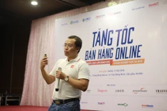 Ông Trần Hải Linh chia sẻ các vấn đề doanh nghiệp gặp phải khi tham gia mô hình thương mại điện tử. (Ảnh: PV/Vietnam+)