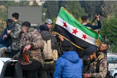 Quân chính phủ Syria đã sụp đổ chóng vánh trước đòn tấn công của phiến quân. (Ảnh: AFP/TTXVN)
