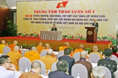 Các đại biểu tham gia phiên thảo luận về chủ đề: Tuyên truyền, vận động, tập hợp các tầng lớp nhân dân; củng cố, tăng cường, phát huy sức mạnh đại đoàn kết toàn dân tộc, xây dựng và bảo vệ Tổ quốc Việt Nam xã hội chủ nghĩa. (Ảnh: TTXVN)