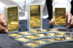 Vàng miếng được trưng bày tại một sàn giao dịch ở Seoul. (Ảnh: Yonhap/TTXVN)