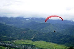 Các vận động viên xuất phát từ bản du lịch cộng đồng Sì Thâu Chải, xã Hồ Thầu, Tam Đường, tỉnh Lai Châu. (Ảnh: Việt Hoàng/TTXVN)