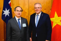 Bí thư Thành ủy Thành phố Hồ Chí Minh Nguyễn Thiện Nhân chào xã giao Thủ tướng Scott Morrison. (Ảnh: Nguyễn Minh/TTXVN)
