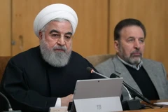 Tổng thống Iran Hassan Rouhani - bên trái. (Ảnh: AFP/TTXVN)