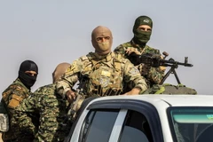 Các tay súng thuộc Lực lượng dân chủ Syria. (Ảnh: AFP/TTXVN)