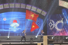 Niềm vui chiến thắng của các thành viên Đội LH - Lightning (Đại học Lạc Hồng - Đồng Nai). (Ảnh: Ninh Đức Phương/TTXVN)