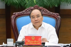 Thủ tướng Nguyễn Xuân Phúc phát biểu tại phiên họp. (Ảnh: Thống Nhất/TTXVN)