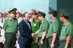 Thủ tướng Nguyễn Xuân Phúc với các đại biểu. (Ảnh: Thống Nhất/TTXVN)