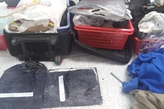 Cocaine bị phát hiện trong các túi nylon, để lẫn trong hành lý, thực phẩm và đồ dùng cá nhân. (Ảnh: Hoàng Hải/Vietnam+)