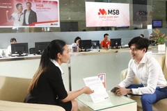 Giao dịch tại MSB. (Ảnh: CTV/Vietnam+)