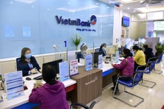 Giao dịch tại VietinBank. (Ảnh: Vietnam+)