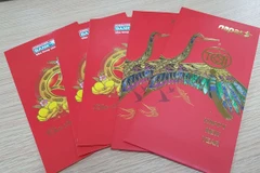 Lì xì luôn là nét đẹp truyền thống mỗi khi Tết đến. (Ảnh: T.H/Vietnam+)