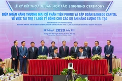Ông Nguyễn Hưng-Tổng Giám đốc TPBank (trái) và ông Nguyễn Hồ Nam-Chủ tịch HĐQT BCG. (Ảnh: CTV/Vietnam+)