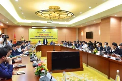 Phó Thống đốc Đào Minh Tú chủ trì hội nghị. (Ảnh: T.H/Vietnam+)