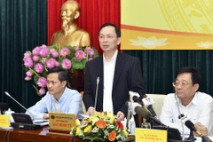 Phó Thống đốc Đào Minh Tú phát biểu tại cuộc họp thông tin về Thông tư số 01 chiều ngày 12/3. (Ảnh: CTV/Vietnam+)