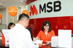 Giao dịch tại MSB. (Ảnh: CTV/Vietnam+)