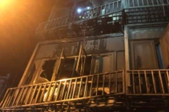 Ngôi nhà bị cháy. (Ảnh TTXVN phát)