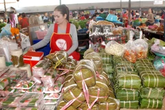 [Photo] Vientiane sôi động đón tết cổ truyền của người Việt