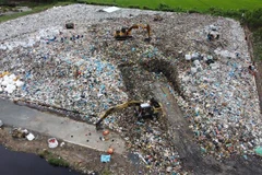 Khu vực ô chôn lấp chất thải rắn sinh hoạt dự phòng số 1 tọa lạc xã Mỹ Thọ, huyện Cao Lãnh (Đồng Tháp). (Ảnh: Nhựt An/TTXVN)