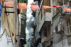 Hiện trường vụ cháy tại Thổ Quan, Hà Nội. (Ảnh: TTXVN phát)