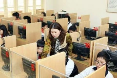 Giờ học Tiếng Anh của học sinh nhóm 1 lớp 7A14 trường Trung học cơ sở Ngô Sỹ Liên, Hà Nội. (Ảnh: Quý Trung/TTXVN)