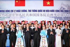 Thủ tướng Trung Quốc Lý Khắc Cường, Phó Thủ tướng Nguyễn Thiện Nhân và các đại biểu dự chương trình giao lưu. (Ảnh: Doãn Tấn/TTXVN)