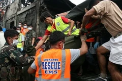 Công tác cứu hộ tại hiện trường vụ tai nạn máy bay. (Ảnh: Getty Images)