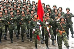 Quân đội nhân dân và Công an nhân dân chịu sự lãnh đạo của Đảng Cộng sản Việt Nam là một tất yếu lịch sử. (Nguồn: TTXVN)