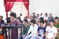 Các bị cáo tại phiên tòa. (Ảnh: Hoàng Tiến/Vietnam+)