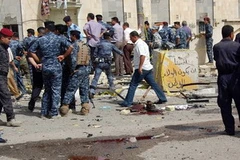 Hiện trường vụ đánh bom xe liều chết ở Basra. (Nguồn: Getty Images)