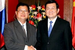 Chủ tịch nước Trương Tấn Sang tiếp ông Somphan Phengkhammy, Phó Chủ tịch Quốc hội Lào. (Ảnh: Nguyễn Khang/TTXVN)