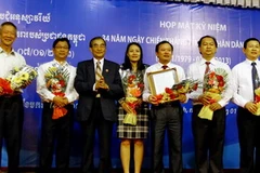 Ra mắt Câu lạc bộ doanh nhân Việt Nam-Campuchia tại lễ kỷ niệm. (Ảnh: Thế Anh/TTXVN)