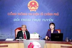 Bộ trưởng Bộ Khoa học và Công nghệ Nguyễn Quân (trái) tại buổi đối thoại trực tuyến. (Nguồn: Chinhphu.vn)